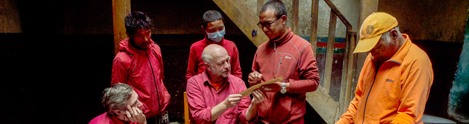 Christian Luczanits inspecting a manuscript together with Khenpo Tsewang Rigzin at Namgyal Monastery, Mustang.